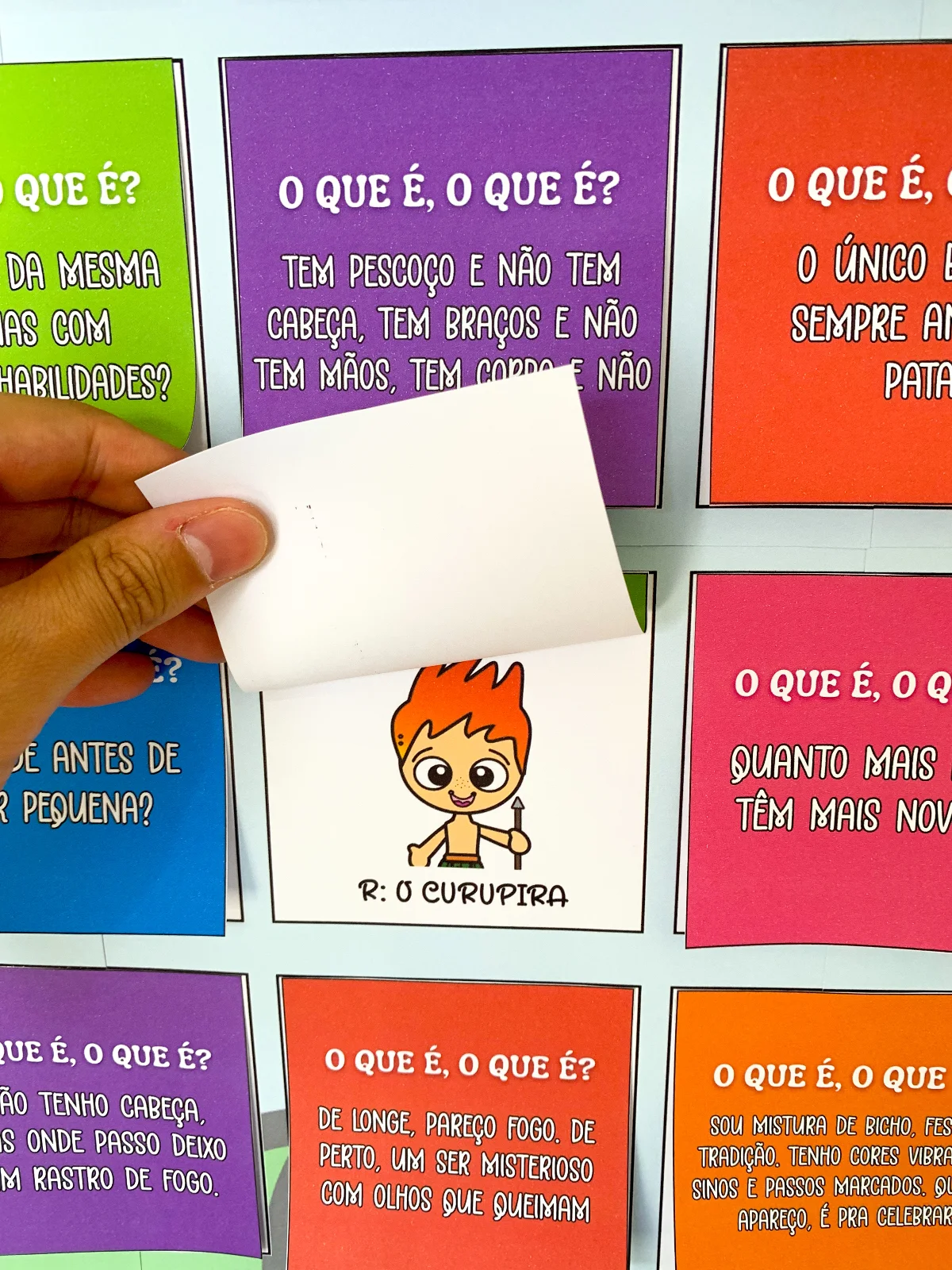 Adivinhas Folclóricas – PDF para Imprimir — amostra 1: Um painel que é pura brincadeira