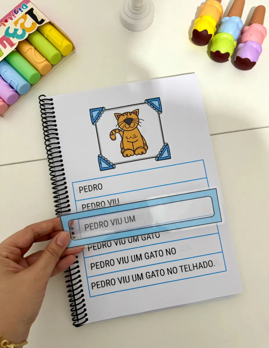 Apostila de Fluência Leitora — Atividades para 1º ano: PDF com 100 frases curtas para treino de leitura, com régua de apoio…