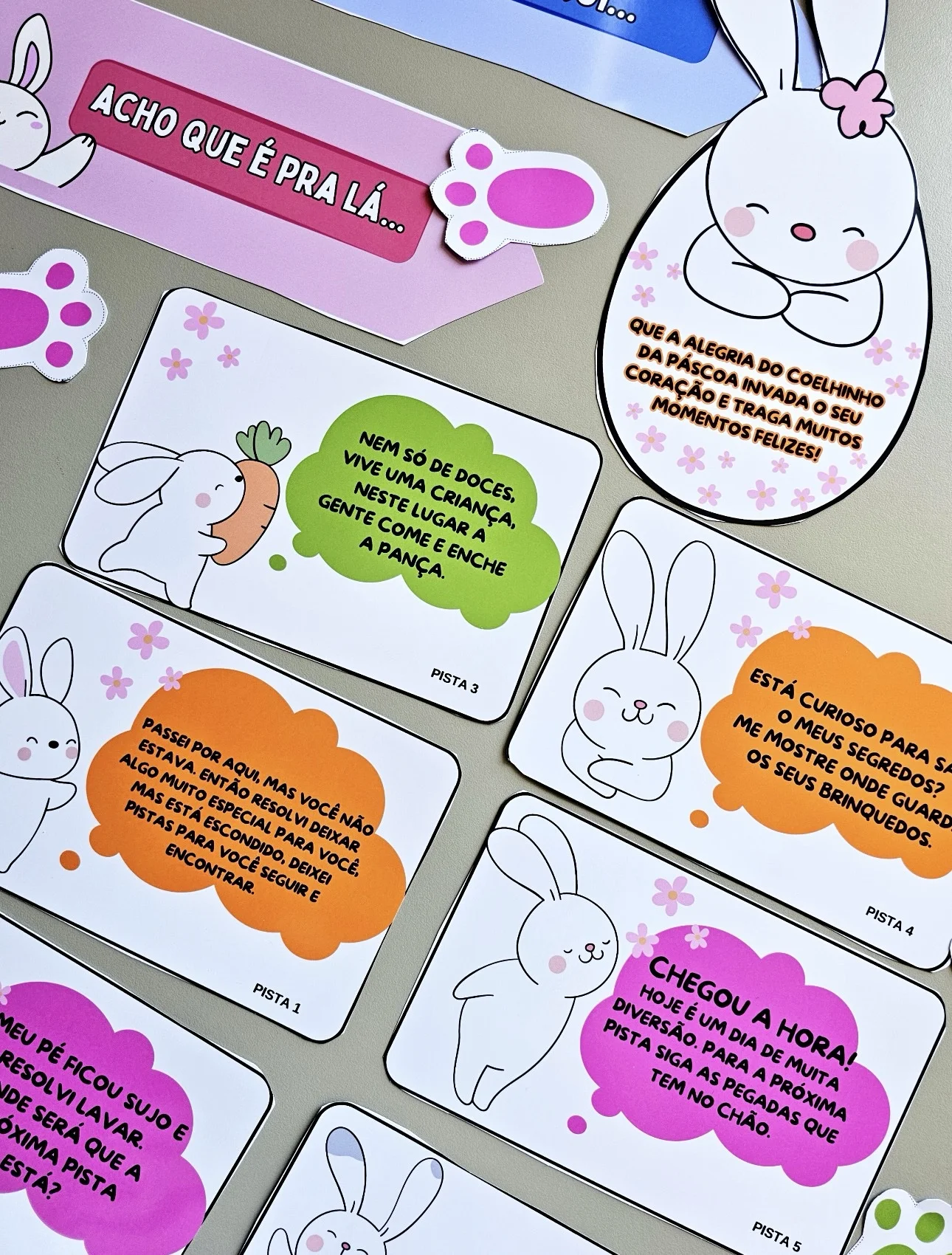 Caça aos ovos — amostra 2: Caça aos ovos com pistas 🐰🥚 Inclui placas, cartões com desafios e pegadas para guiar a criança…