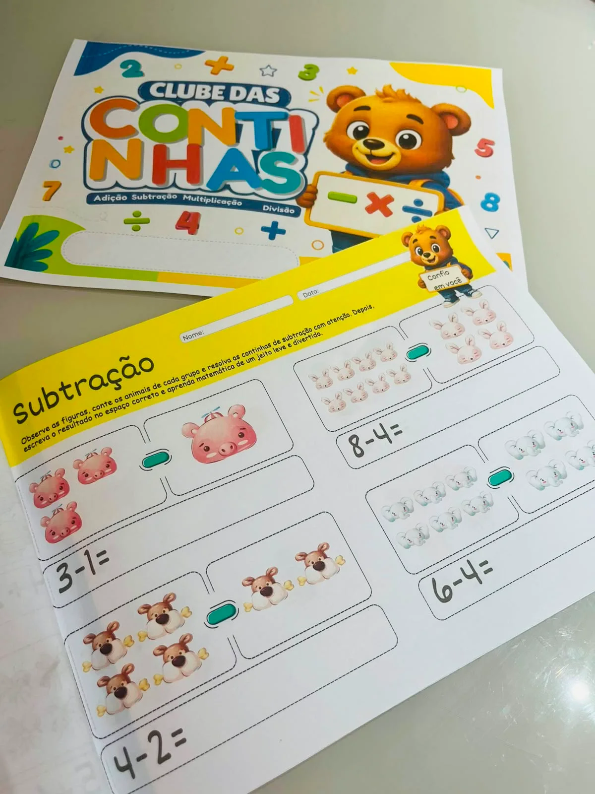 CLUBE DAS CONTINHAS — amostra 2: 🧮 CLUBE DAS CONTINHAS 🐻🔢 Seu aluno precisa praticar Matemática, mas uma folha cheia de…