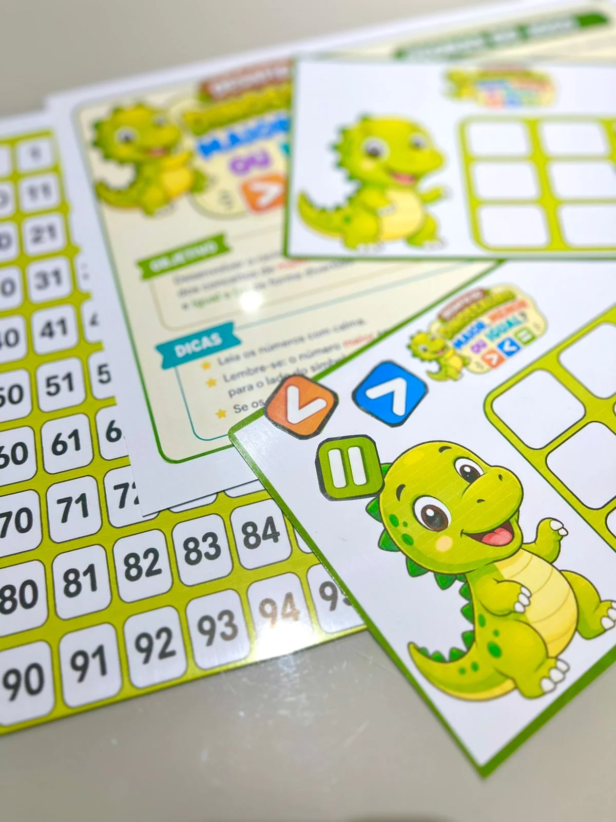 DESAFIO DO DINOSSAURO MAIOR E MENOR QUE – PDF para Imprimir — amostra 1: O que vem no material