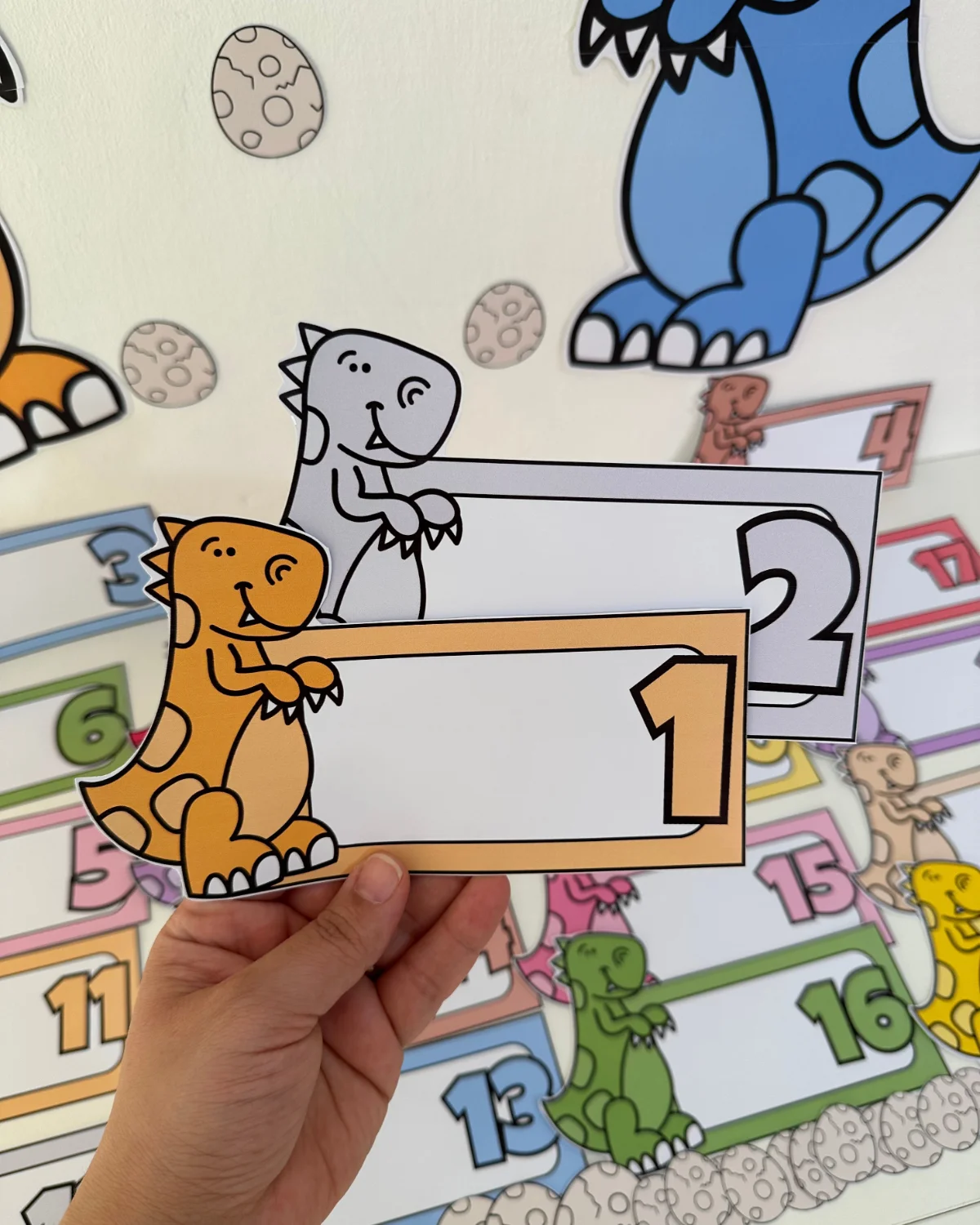 Dinossauros da Contagem — amostra 4: Recurso pedagógico em PDF com 20 fichas numeradas e painel temático de dinossauros… Dinossauros da Contagem — amostra 4: Recurso pedagógico em PDF com 20 fichas numeradas e painel temático de dinossauros…