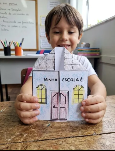 Dobradura da escola — capa do material