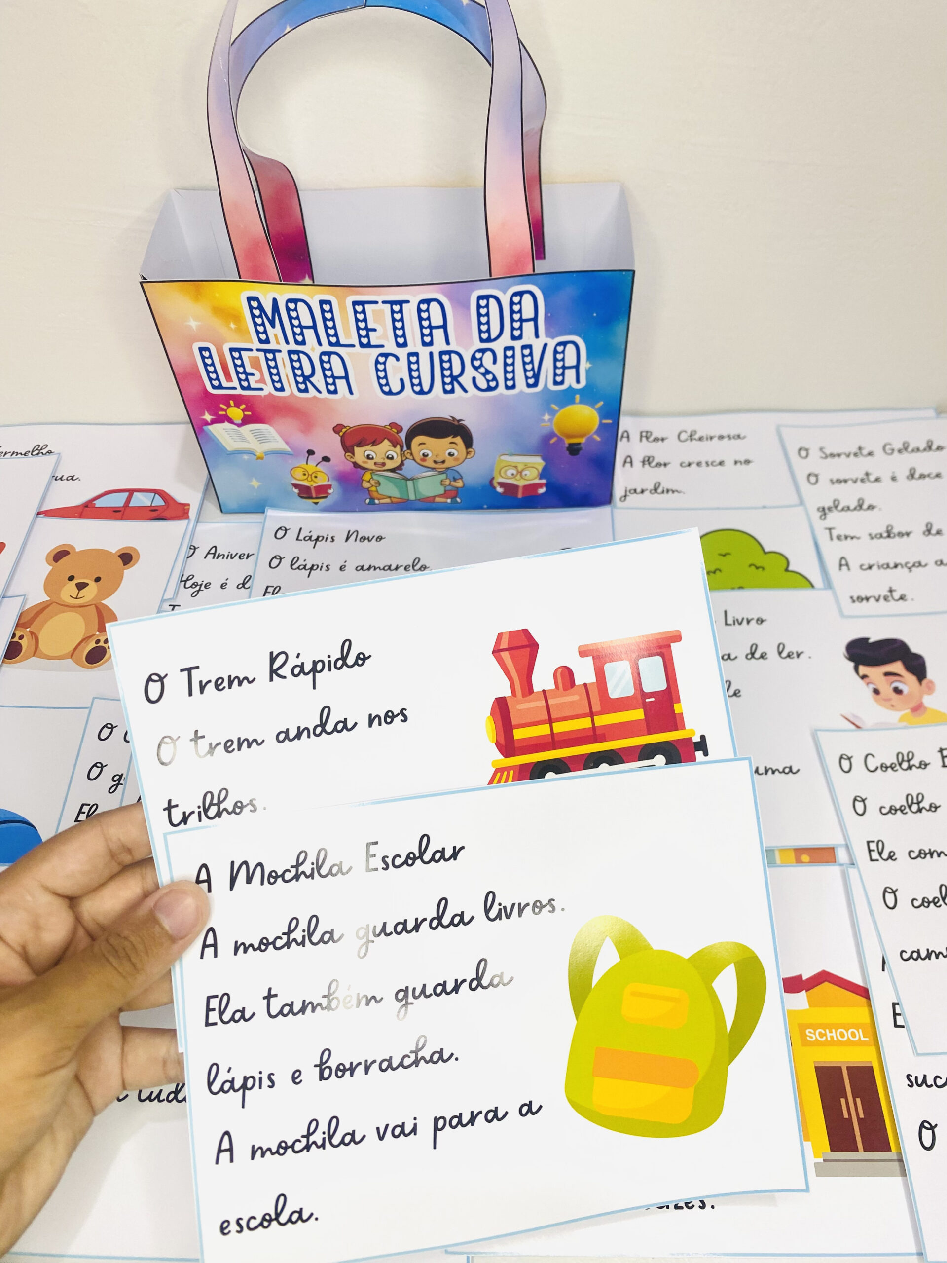 Maleta da letra cursiva | Alfabetização — amostra 2: Sobre o MALETA DA LETRA CURSIVA