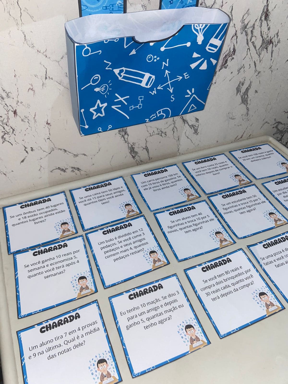 Matemática expressões númericas 5º ano - painel charadas – Material Pedagógico — amostra 1: O que vem no material