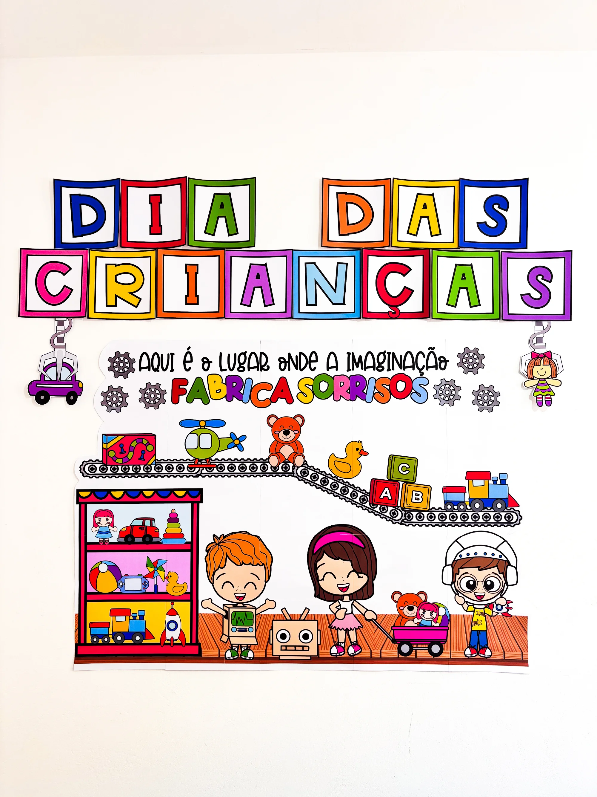 Painel Dia das Crianças: Fábrica de Sorrisos — amostra 3: Painel do Dia das Crianças em PDF tema Fábrica de Brinquedos