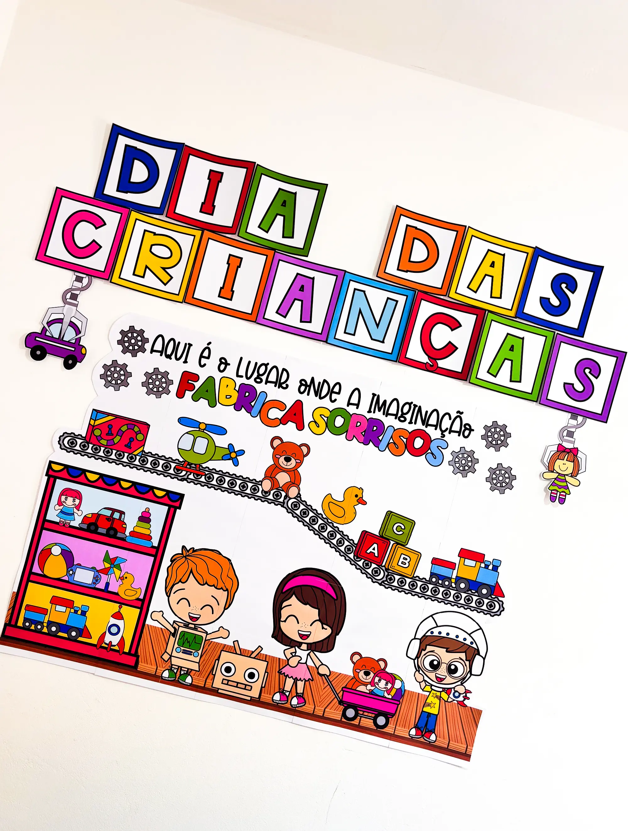 Painel Dia das Crianças: Fábrica de Sorrisos — amostra 7: Painel do Dia das Crianças em PDF tema Fábrica de Brinquedos