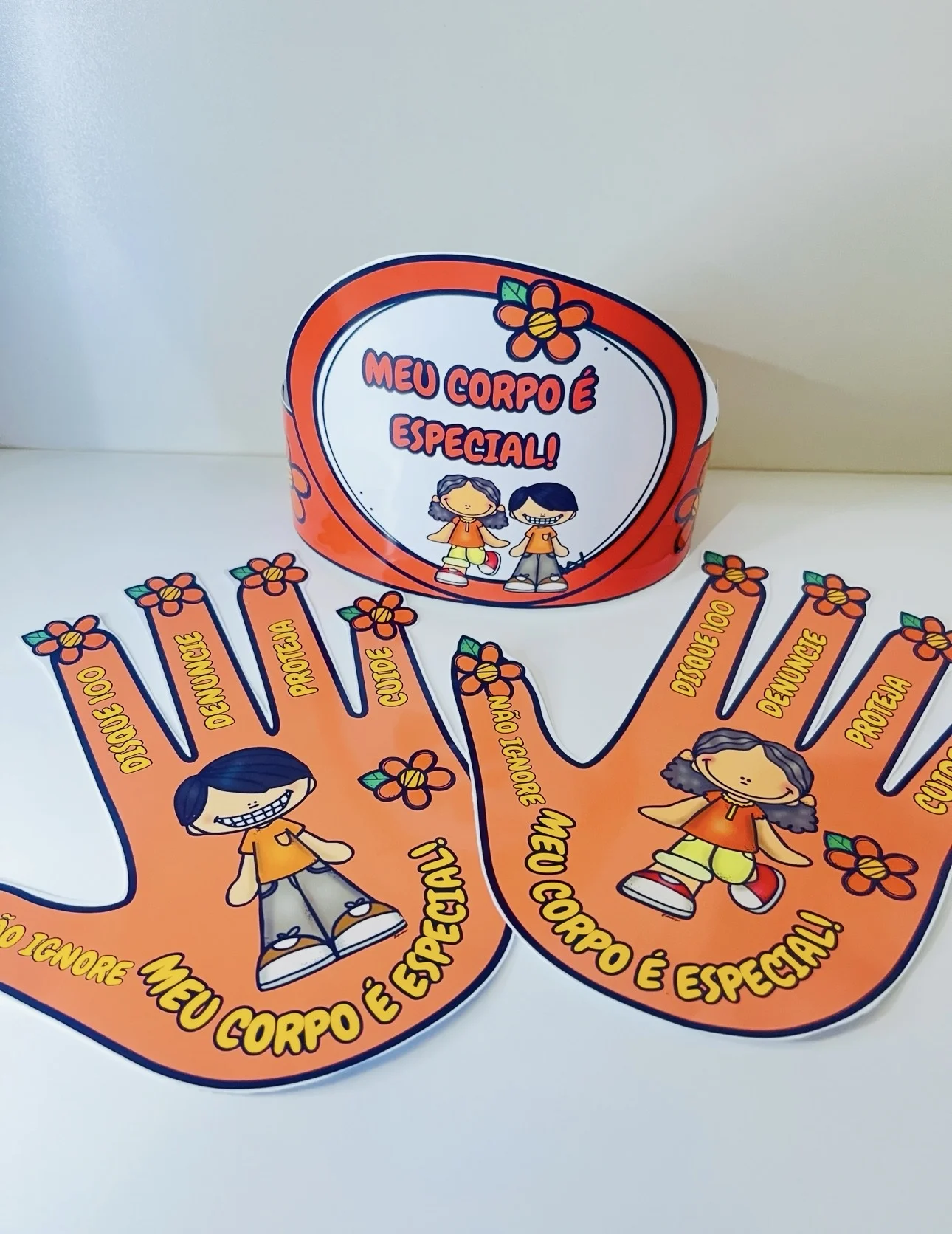 Produto — Datas comemorativas para Todas as séries: 🧡✋ Coroa e Placa Mãozinha – Maio Laranja com Amor e Conscientização