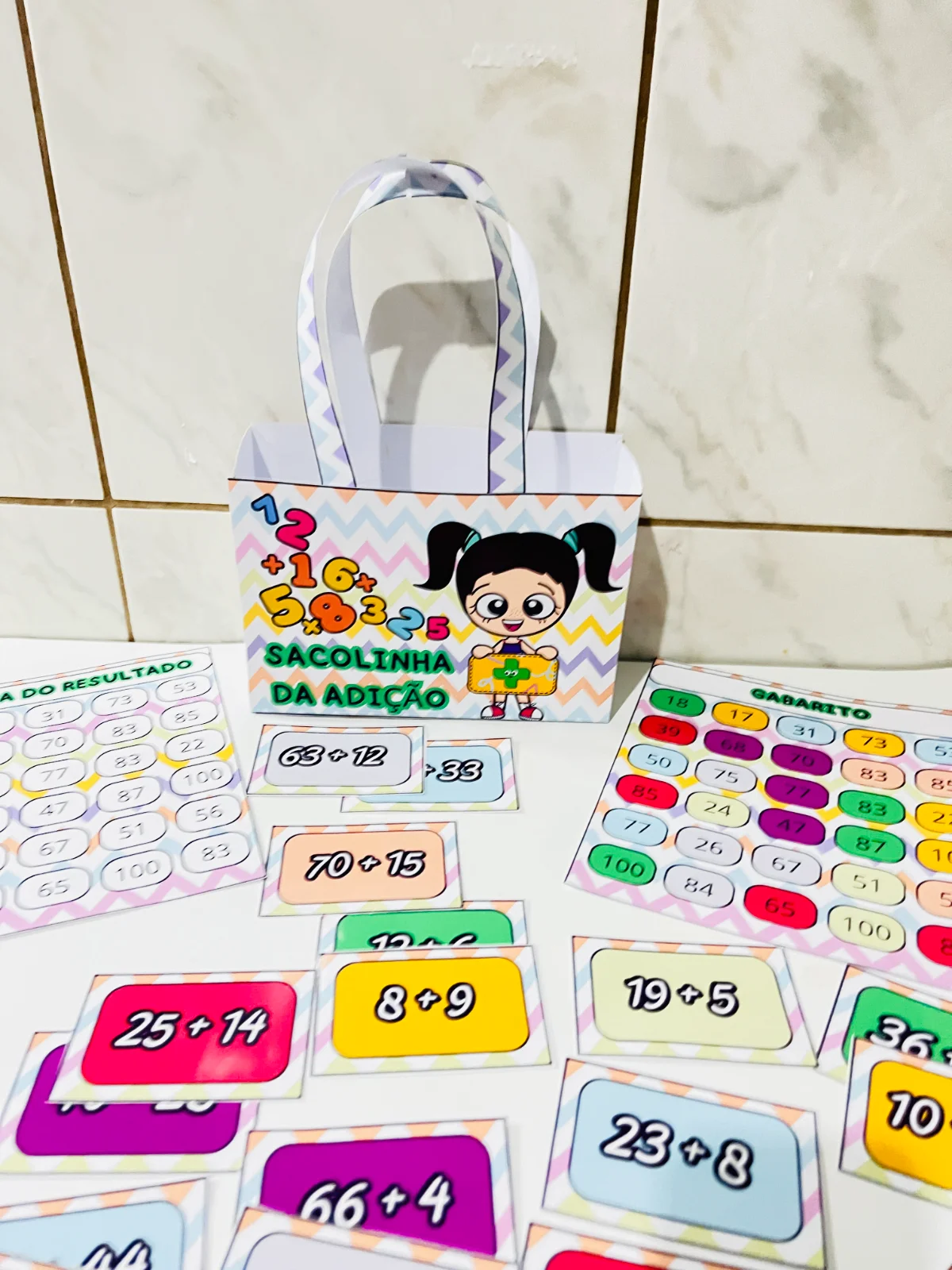 Sacolinha da Adição Divertida – 30 Cards para Trabalhar Adição — amostra 6: Recurso lúdico com 30 cards de adição e prancha…